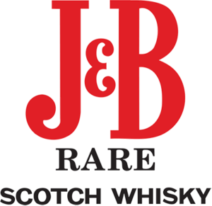 J&B (Justerini & Brooks) este un renumit brand de whisky scoțian, care a devenit cunoscut în întreaga lume pentru blendurile sale accesibile și ușor de băut. Istoria J&B începe în 1749, când Giacomo Justerini, un italian imigrant, și partenerul său, George Johnson, au fondat o companie de vinuri și spirtoase în Londra. Acest parteneriat a evoluat de-a lungul secolelor, iar în secolul al XIX-lea, Alfred Brooks a achiziționat afacerea, redenumind-o Justerini & Brooks, de unde și numele J&B. J&B s-a specializat în crearea de blenduri de whisky, cel mai faimos fiind J&B Rare. Acest blend include aproximativ 42 de malturi și whisky-uri de cereale diferite, majoritatea provenind din regiunea Speyside din Scoția. Datorită compoziției sale echilibrate, J&B Rare are un profil gustativ caracterizat prin note fructate și un finisaj ușor, făcându-l popular atât printre consumatorii obișnuiți, cât și în barurile din întreaga lume. Pe lângă J&B Rare, brandul a dezvoltat și alte variante, cum ar fi J&B Urban Honey și J&B Reserve, fiecare cu caracteristici unice pentru a satisface diferite palate. J&B Urban Honey, de exemplu, este un spirit infuzat cu miere, care oferă o dulceață naturală și un profil aromatic diferit de cel al unui whisky tradițional. J&B este recunoscut nu numai pentru calitatea whisky-urilor sale, dar și pentru inovație și adaptabilitate. A fost extrem de popular în anii '60 și '70, în special în Statele Unite, unde campaniile sale de marketing pline de stil au capturat esența unei ere de distracție și libertate.